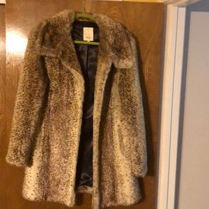 Faux fur coat with pockets